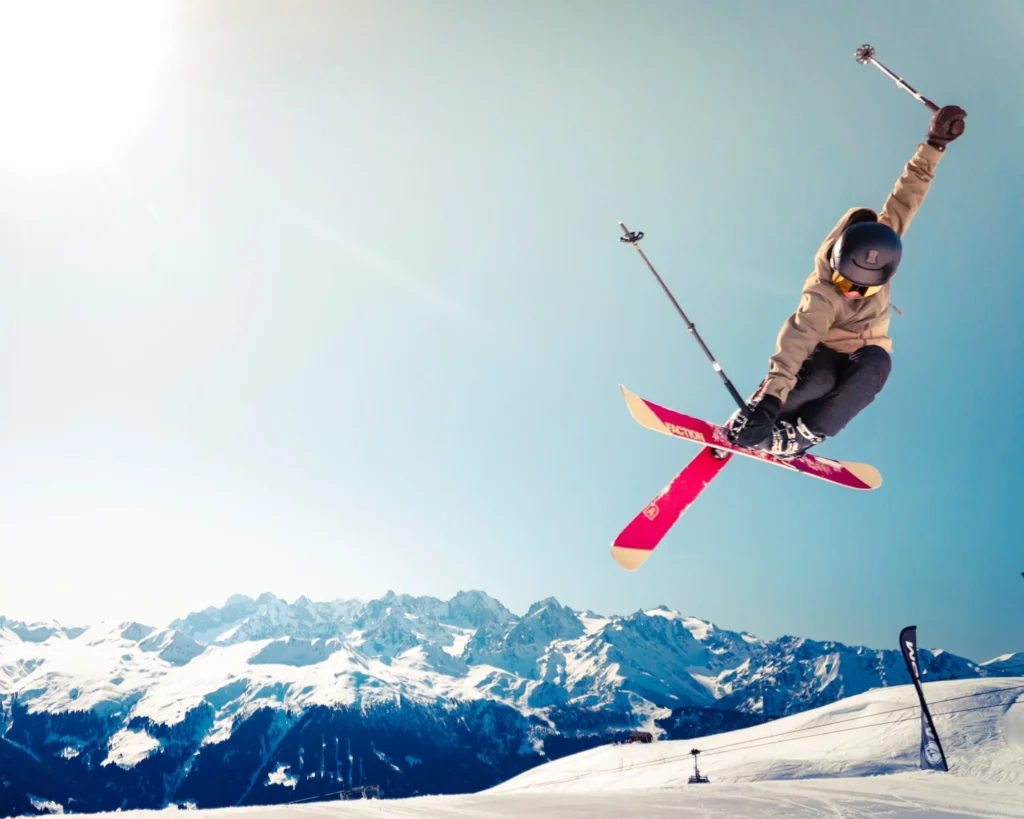 Skiers enjoying snowy slopes in Colorado’s mountain climate.