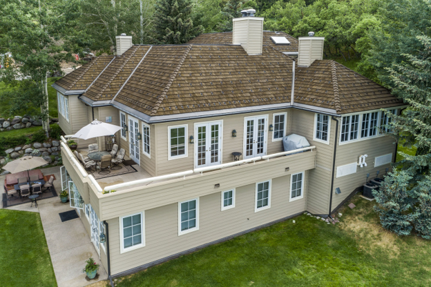 Synthetic composite faux cedar shake roof.