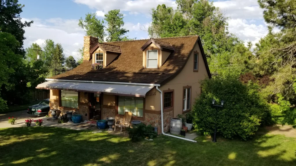 Rustic Flathead Lake residence featuring CEDUR Walden synthetic shake roofing.