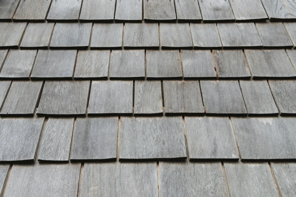 An image of Cedar planks as a roofing material.