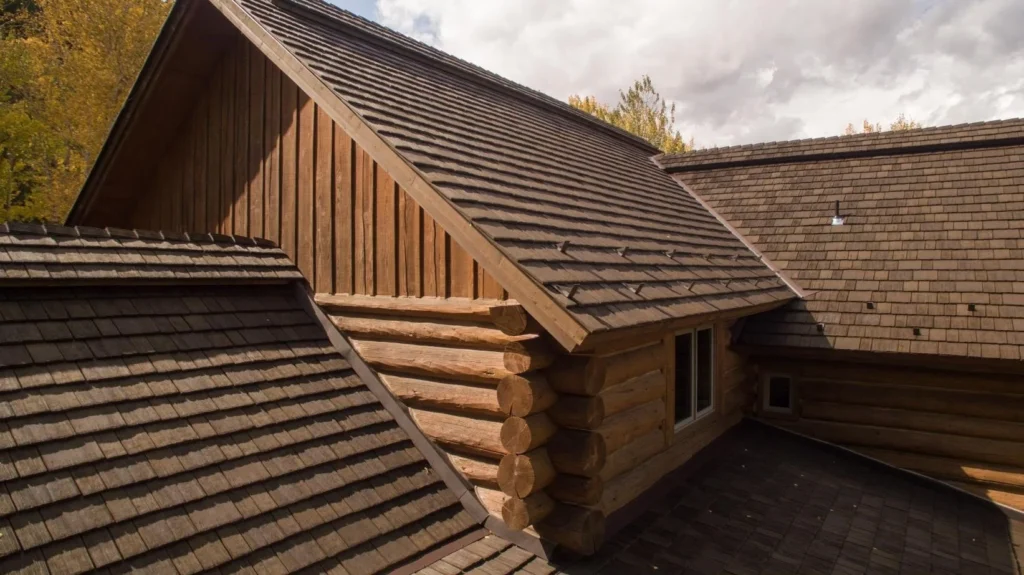 a log cabin style home with synthetic shingles. 
