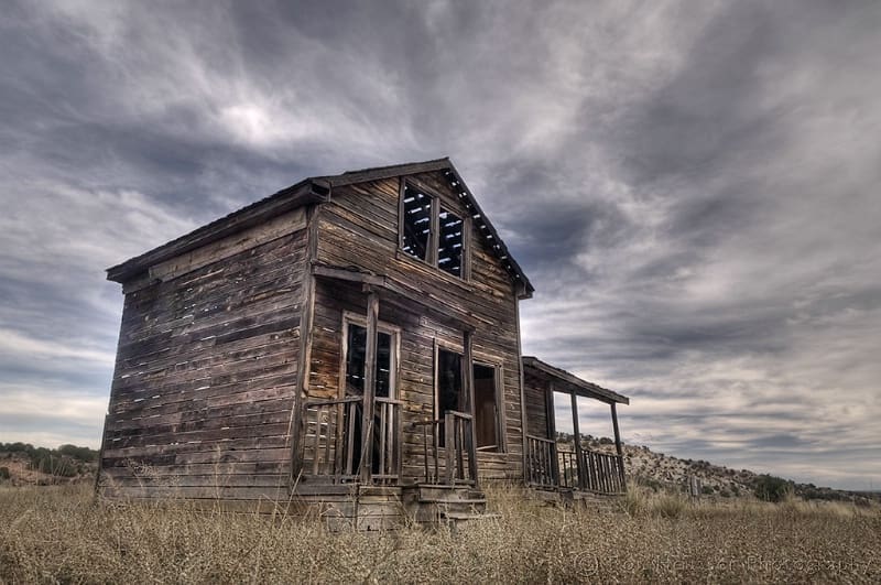 Old wooden structure at a national park featuring rustic wood construction.