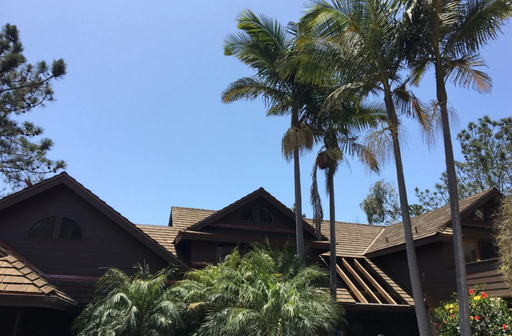 A CEDUR synthetic roof on a house in a  tropical setting. 