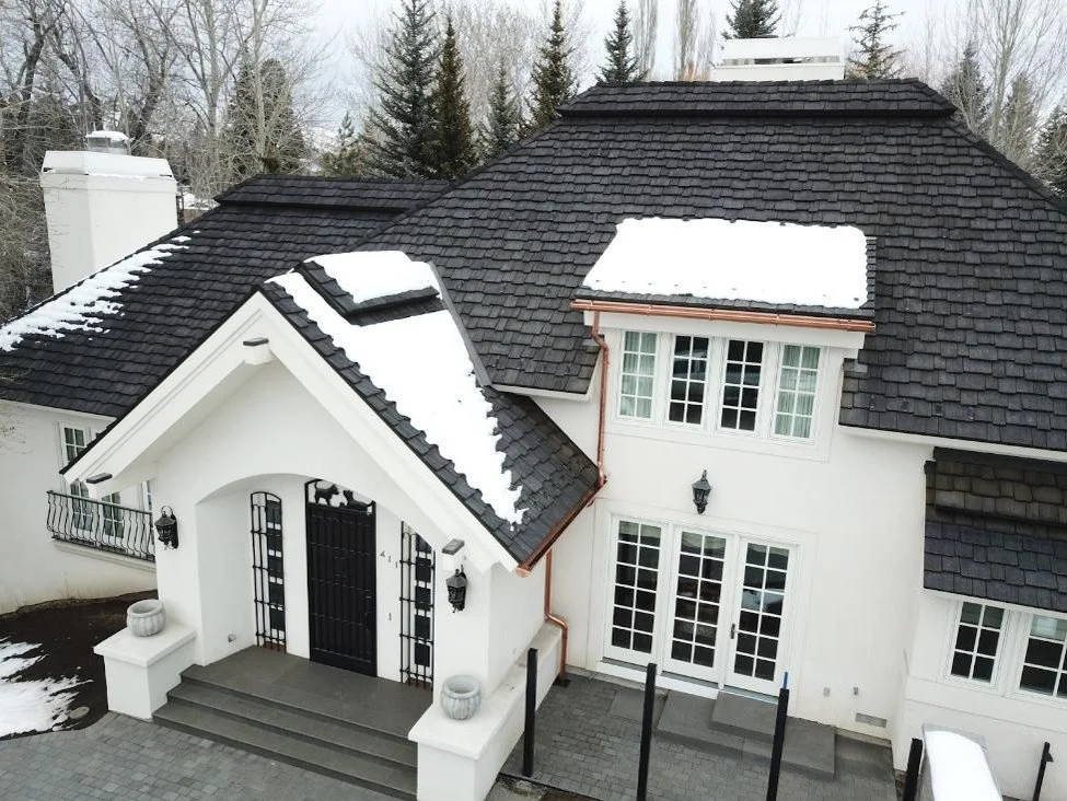 A snowy home in Colorado with synthetic CEDUR shingles. 