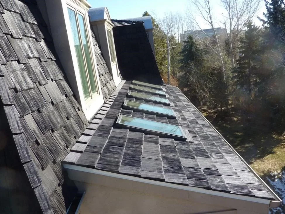 image of a Cedar roof shingles and solar windows. 