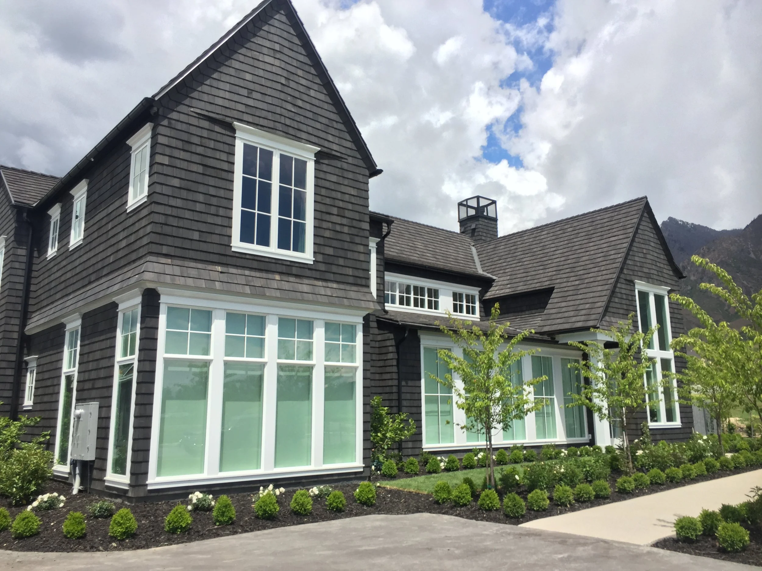 Mountain home with shake siding that matches the roof.