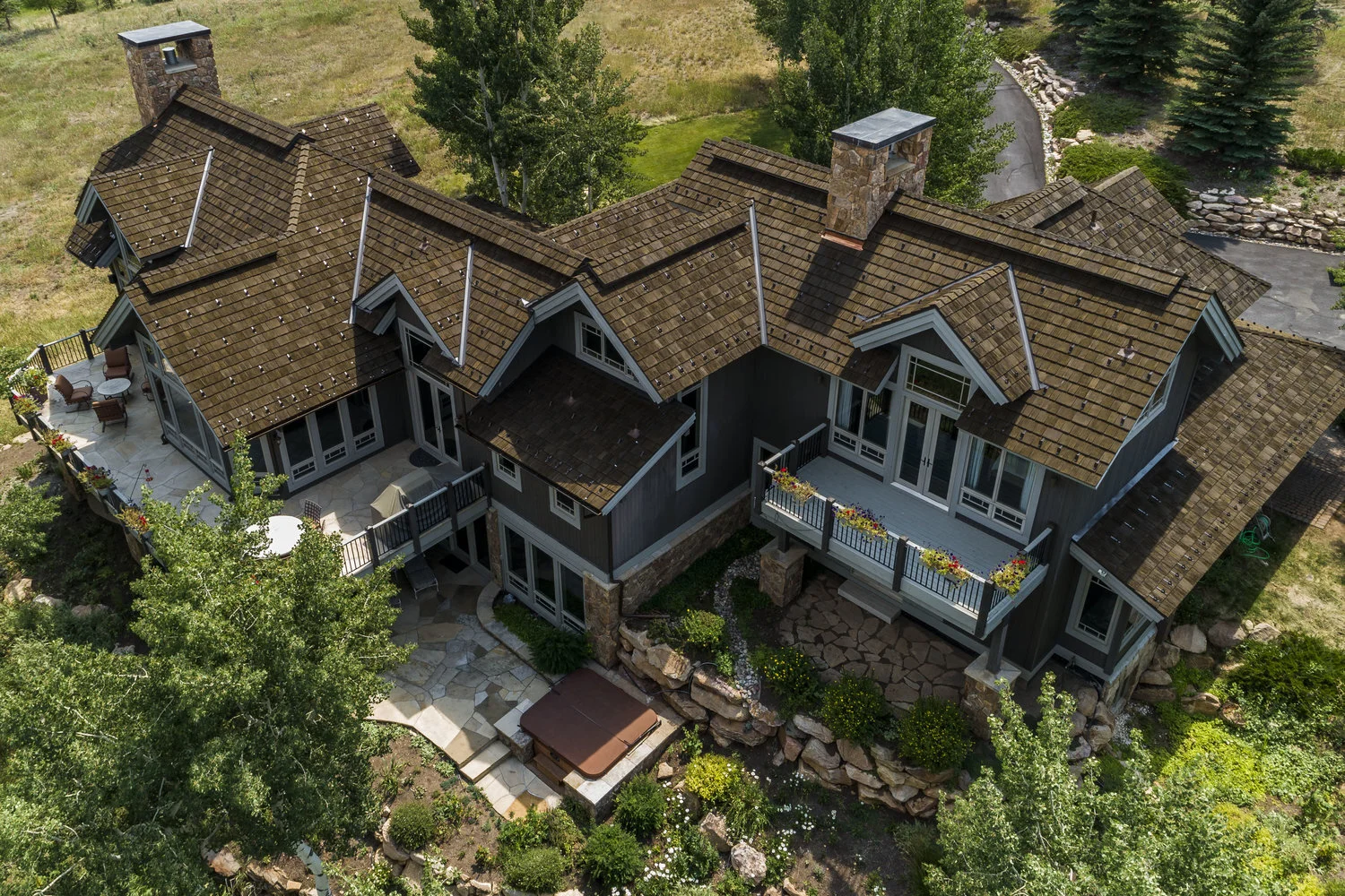 Dark brown roof on a mountain home.