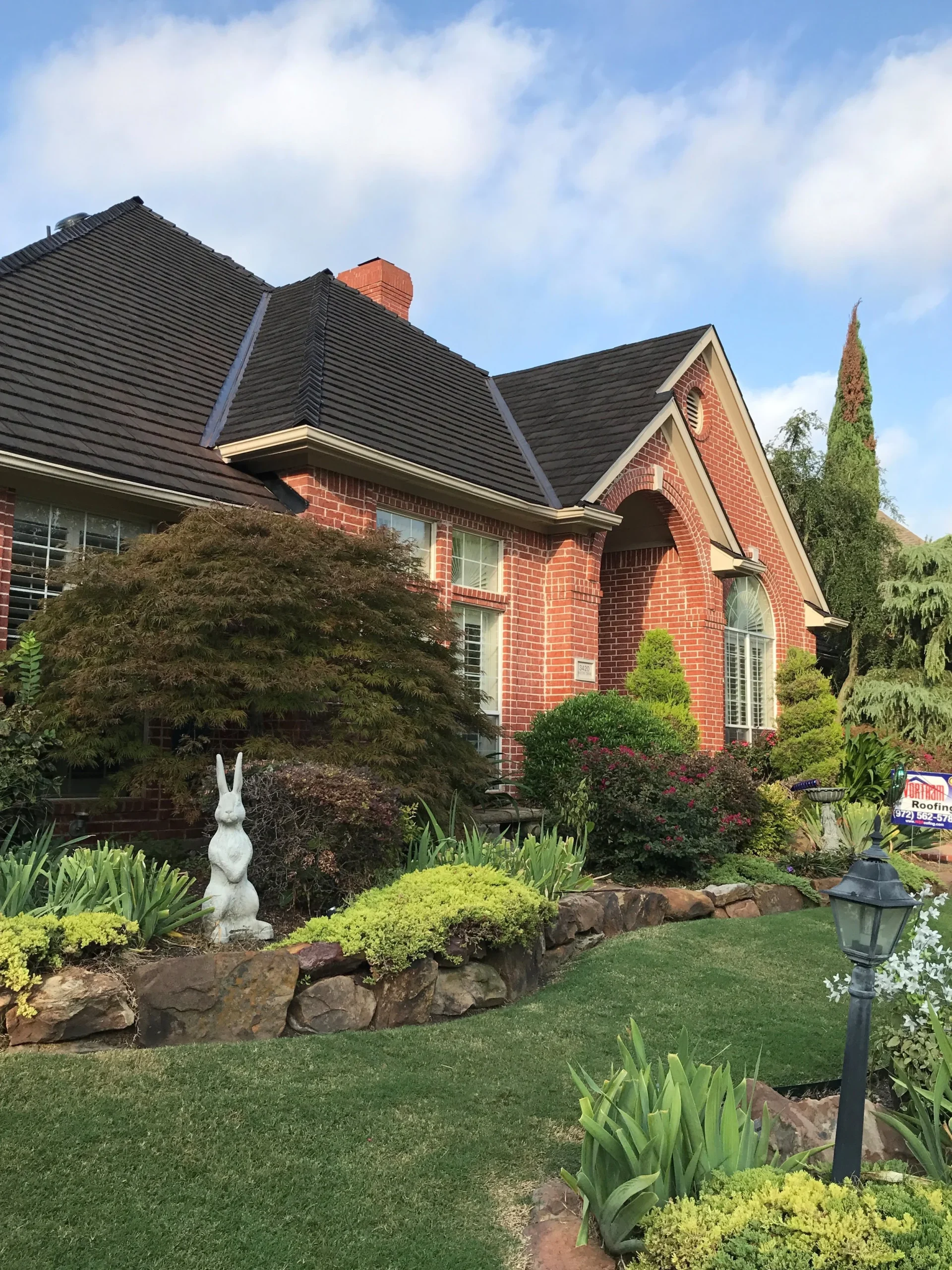 Shiloh roofing on a brick house.