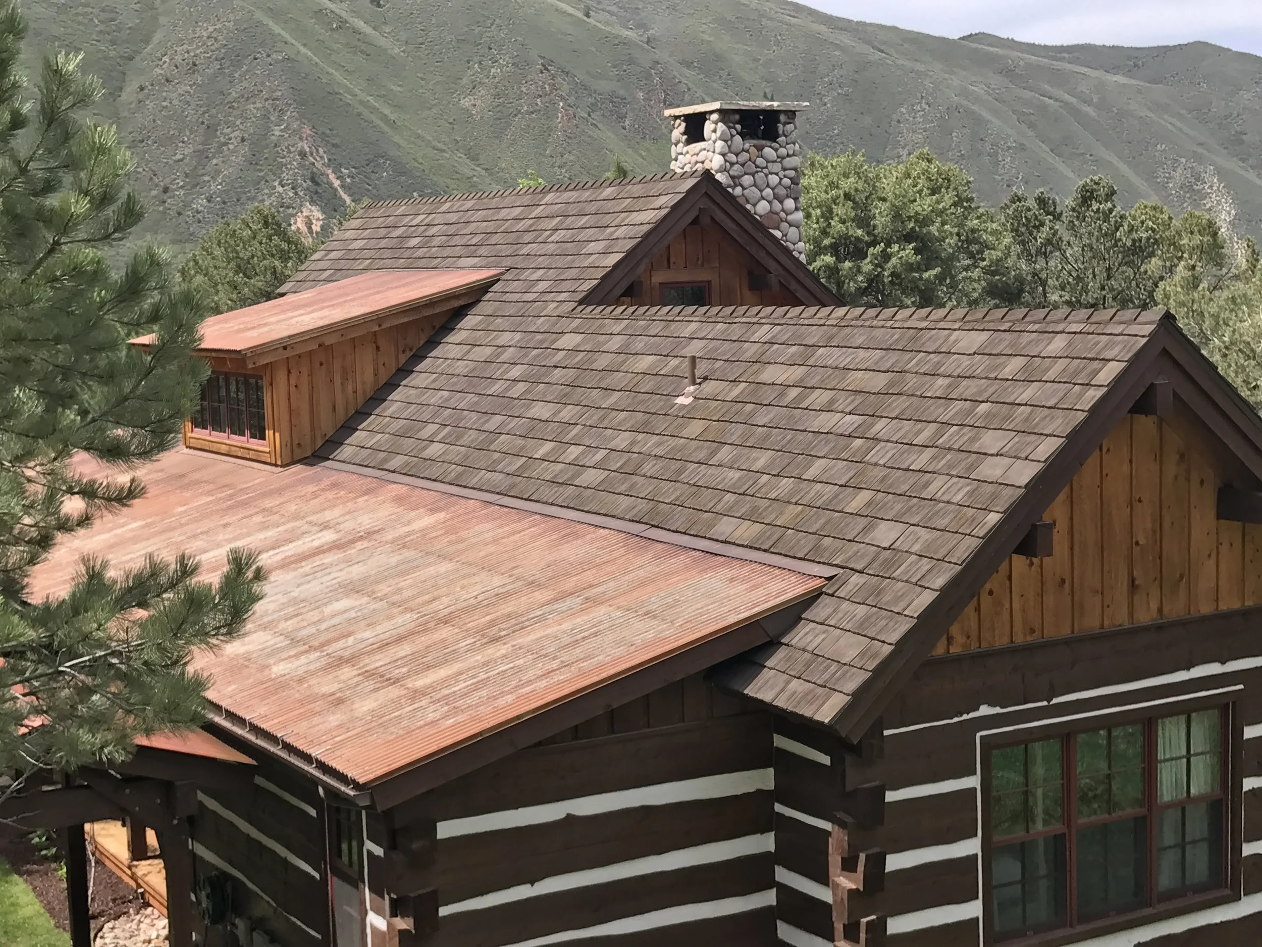 CEDUR Walden roof on a mountain side home.