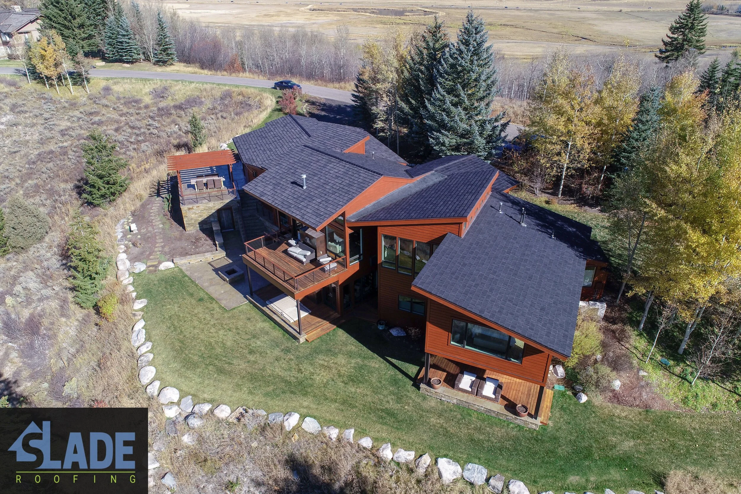 Aerial photo of wood shake shingle composite faux roof.