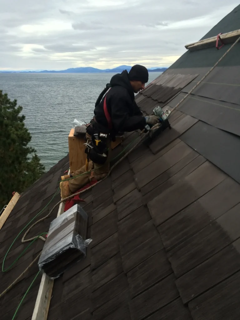 Cedar wood shake shingle composite roof installation in Montana