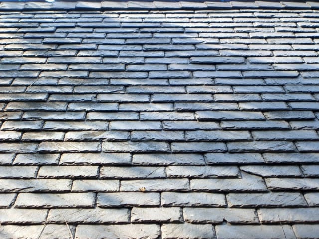 Natural slate roof installed on a residential home.