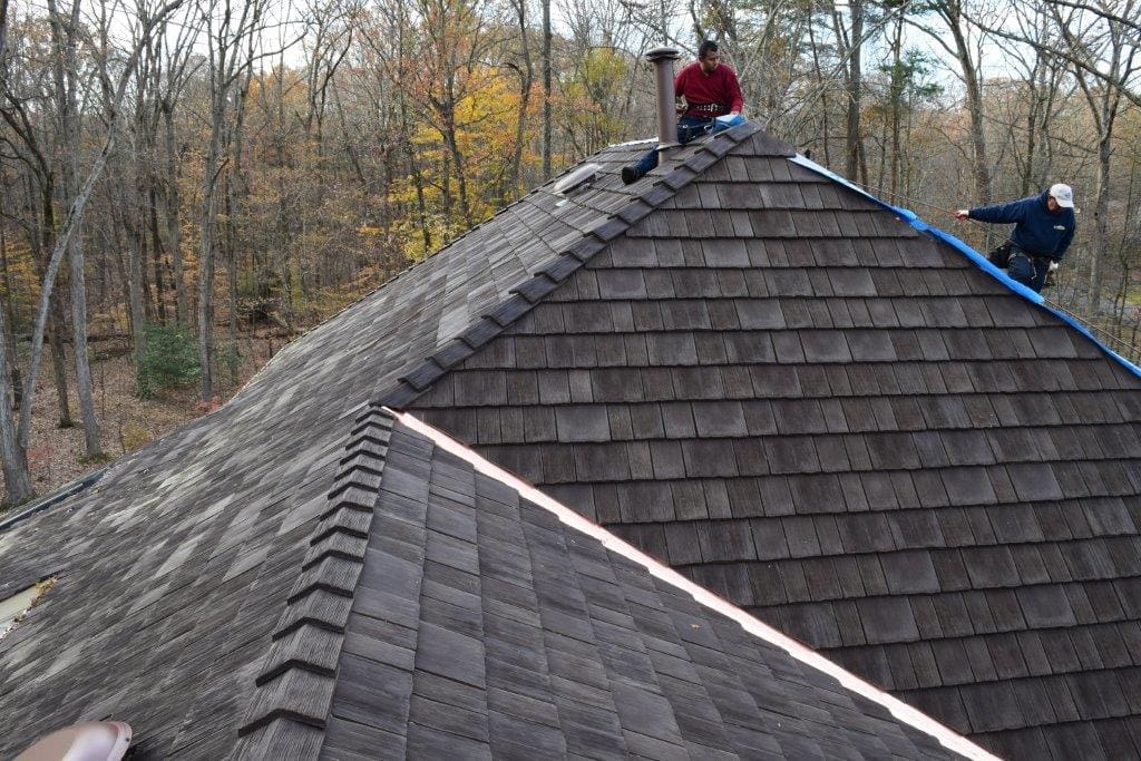 Modern home featuring durable synthetic cedar shake roofing.