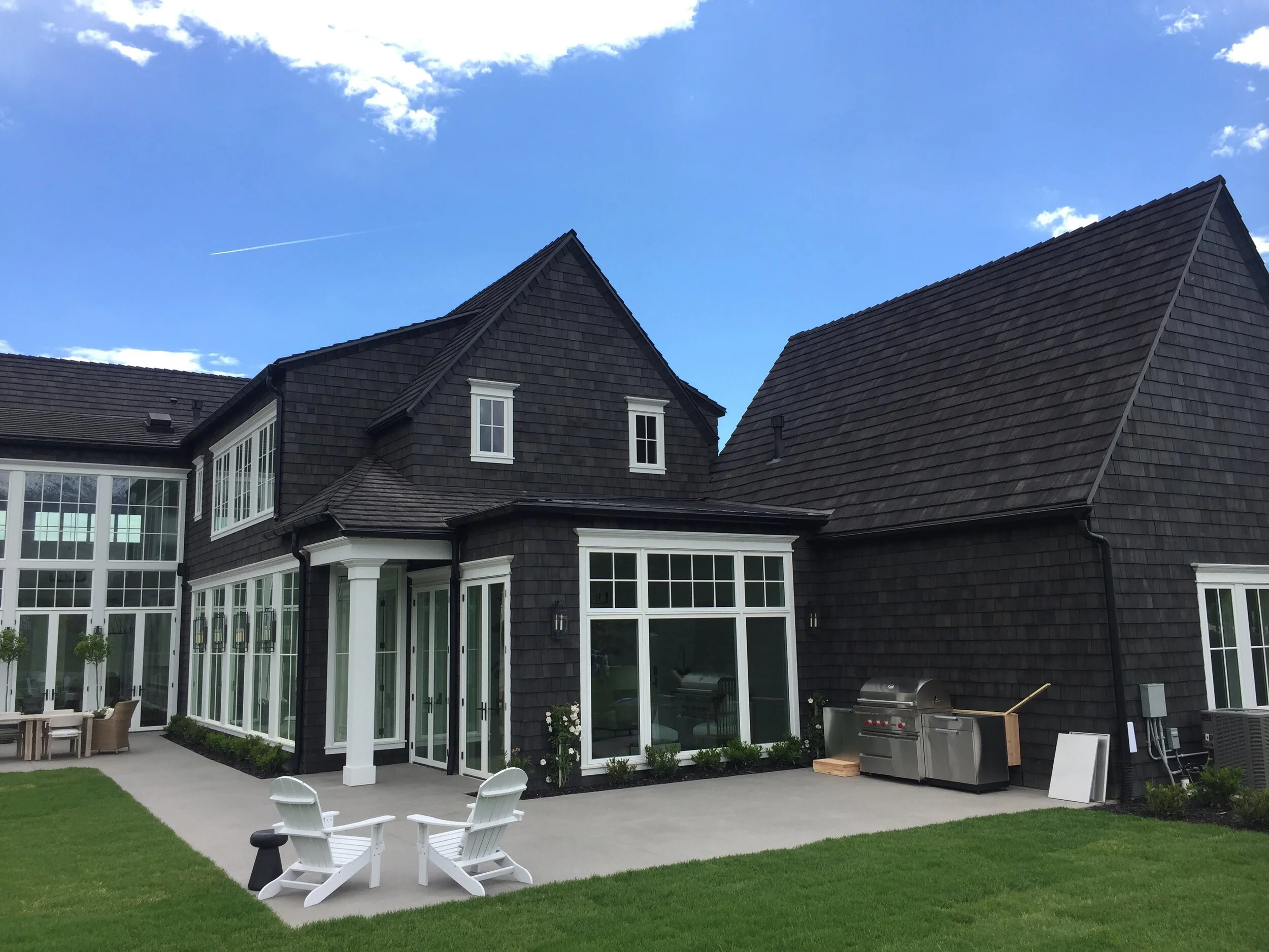 Dark siding and roof combo.