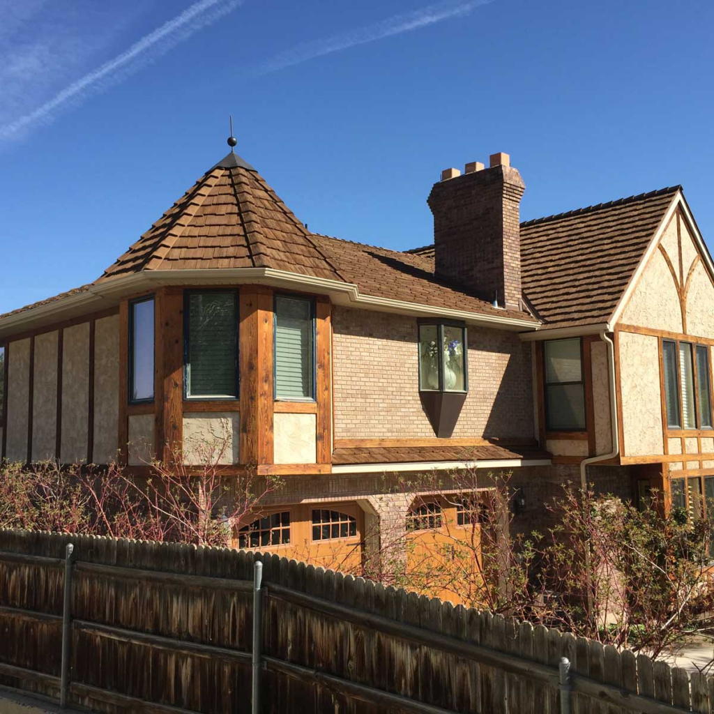 A home with golden cedar shake siding.