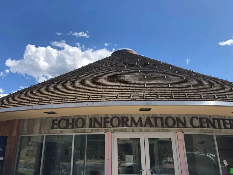 Echo Information Center in Utah featuring CEDUR Walden synthetic shake roof of a circular building.