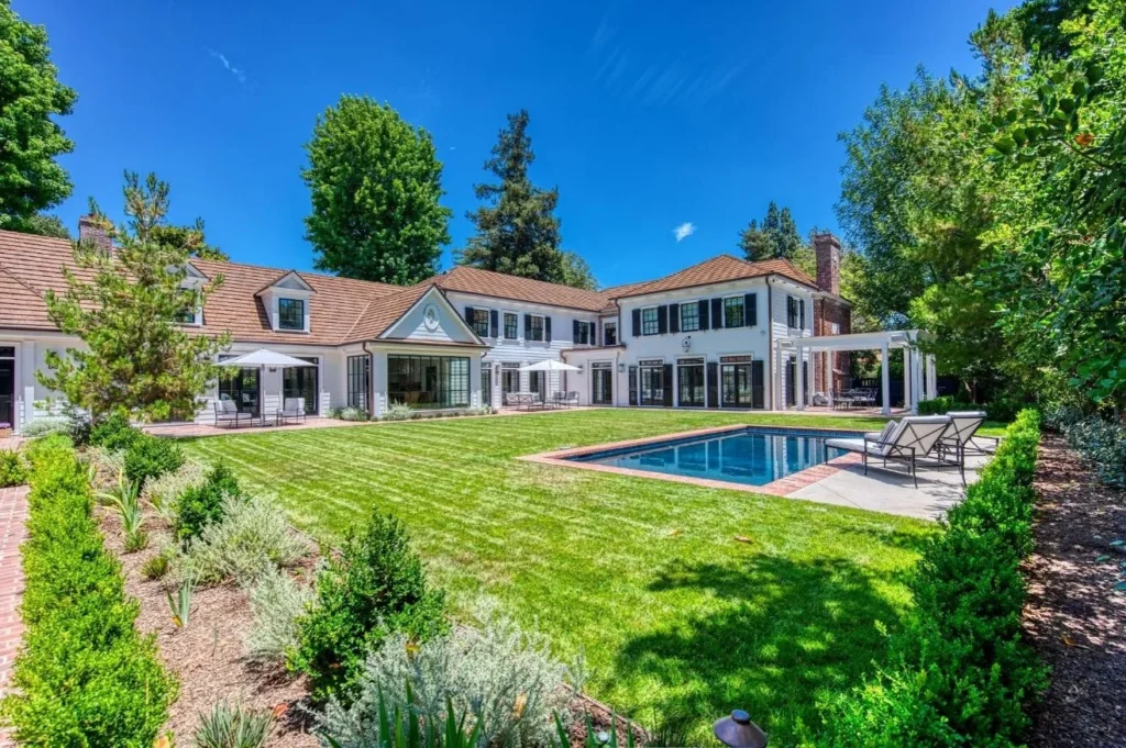 Home with a large backyard and pool. 